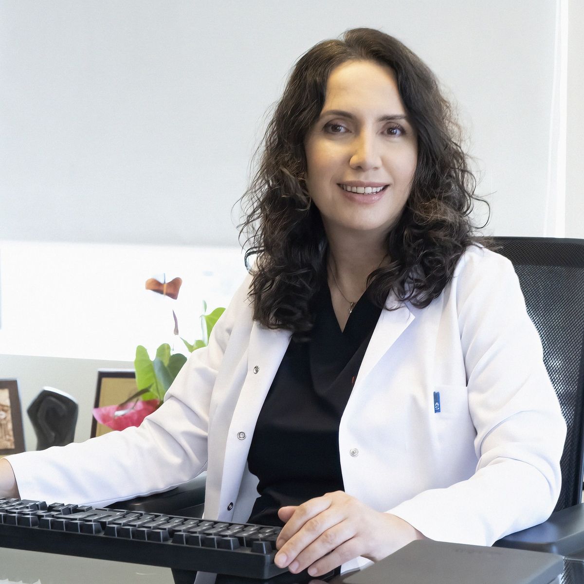 Prof. Dr. Ayşenur Meriç Hafız at her desk